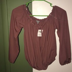 mauve colored blouse